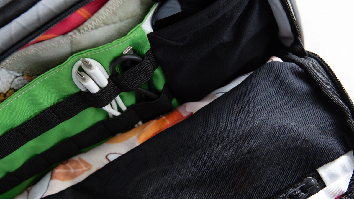 Close-up macro shot of the ZSA Backpack's X-Pac RX30 fabric texture and premium stitching detail