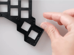 Holding the small translucent piece for the LEDs