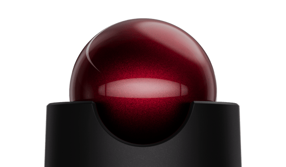 A red trackball nested in its housing