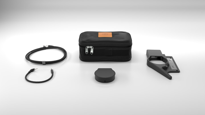 Navigator Trackpad core, shell, braided TRRS cables, and carrying case arranged in the box
