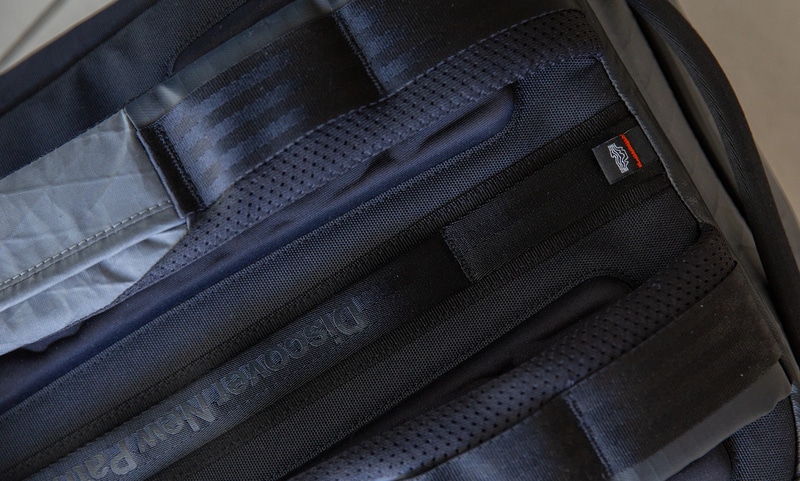 Detail shot of the ZSA Backpack's custom hardware and FIDLOCK magnetic buckle system