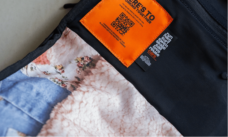 Detail view of the durable recycled banner material used for the backpack's unique interior lining.