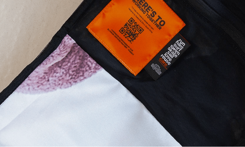 A different unique color and texture of the recycled interior banner, showing the 'one of a kind' nature of each bag.